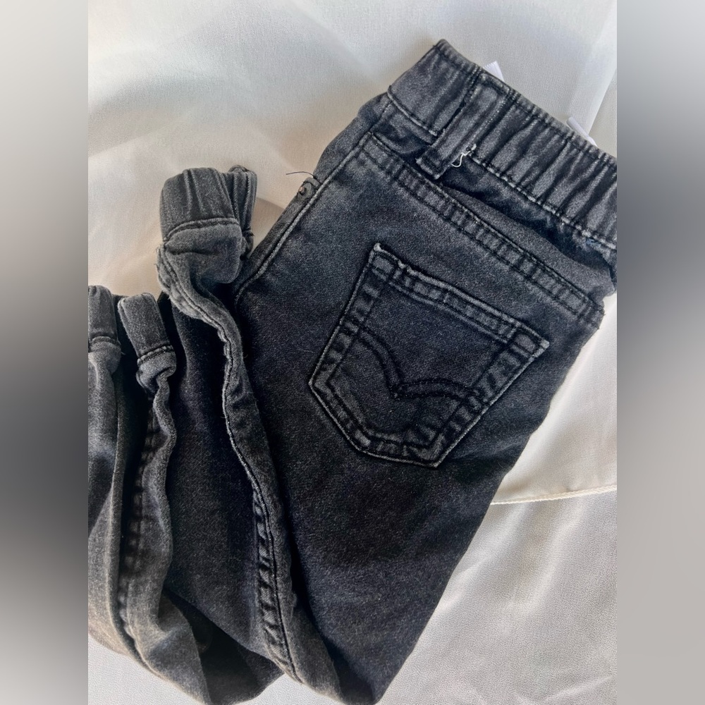 Distressed black Levi’s joggers